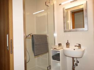 Kúpeľňa v ubytovaní Apartamenty Tatrzańska Dolina + 30 fotografií