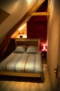 מיטה או מיטות בחדר ב-Les Gîtes du Villajou