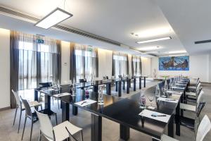 Área de negócios e/ou sala de conferências em Smy Aran Blu Roma Mare