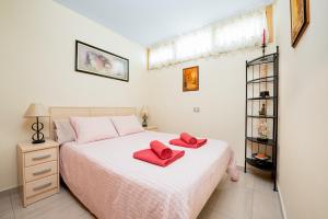 Posteľ alebo postele v izbe v ubytovaní nikis Flat