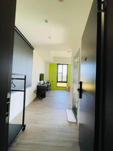 Rúm í herbergi á Chao Zhou 86 B&B