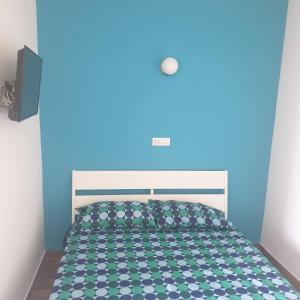 SUITEVISTAMARE Copanello-Caminia-Soverato tesisinde bir odada yatak veya yataklar