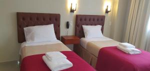 Кровать или кровати в номере Hotel Vitalia