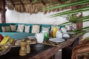 a table that has some food on it at Casa Blanca in Holbox Island