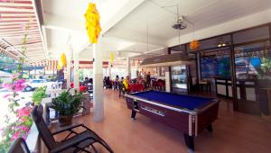 a pool table in the middle of a restaurant at Lotus Friendly Hotel in Chaweng