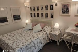 Luxury House Love tesisinde bir odada yatak veya yataklar