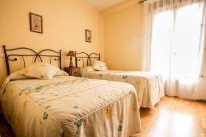 Posteľ alebo postele v izbe v ubytovaní Hotel Rural El Paraiso de Gredos