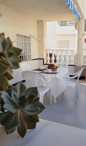 Posedenie v ubytovaní Apartamentos Bajel