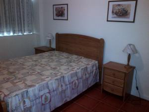 Ліжко або ліжка в номері Apartamentos Varandas da Rocha