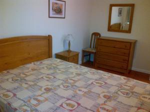 Ліжко або ліжка в номері Apartamentos Varandas da Rocha