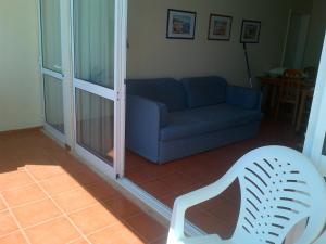 Зона вітальні в Apartamentos Varandas da Rocha