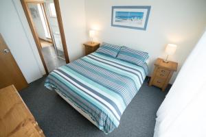 Кровать или кровати в номере SeaWatch-Sea Views