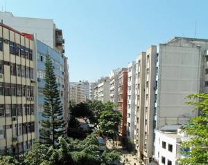 a view of a city with tall buildings at Ipanema Beach Residence in Rio de Janeiro