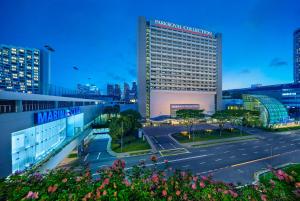 a view of the marriott convention center in the city at PARKROYAL COLLECTION Marina Bay, Singapore in Singapore