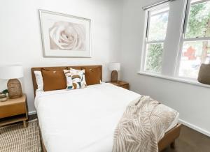 Cama o camas de una habitación en Just book it! Ruby - a spacious house in the CBD