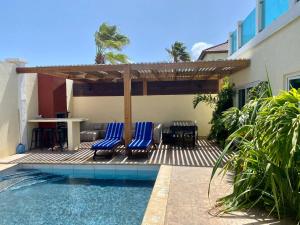 The swimming pool at or near Villa Pool Walk To Palm Beach Ideal For Groups