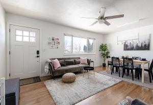 a living room with a couch and a table at Well-Stocked, Family Friendly Home on the Westside STR-1669 in Colorado Springs
