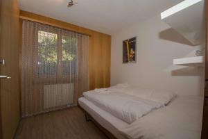 Postel nebo postele na pokoji v ubytování Ferienwohnung Helios