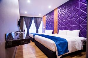 Postel nebo postele na pokoji v ubytování U3 HOTEL