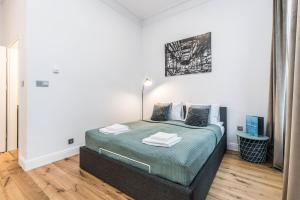 Posteľ alebo postele v izbe v ubytovaní Rent like home - Księcia Józefa Poniatowskiego 2