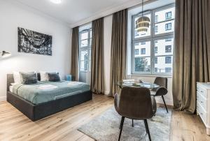 Posteľ alebo postele v izbe v ubytovaní Rent like home - Księcia Józefa Poniatowskiego 2