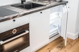 Kuchyňa alebo kuchynka v ubytovaní Rent like home - Księcia Józefa Poniatowskiego 2