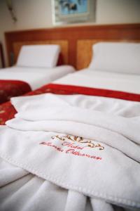 Postel nebo postele na pokoji v ubytování Santa Ottoman Hotel