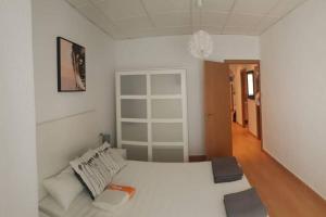 Postel nebo postele na pokoji v ubytování COZY Apartment In The Heart of Alicante!