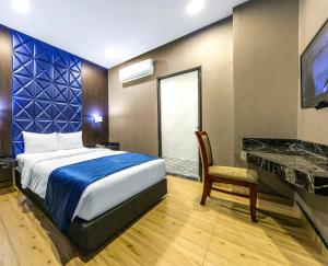 Postel nebo postele na pokoji v ubytování U3 HOTEL