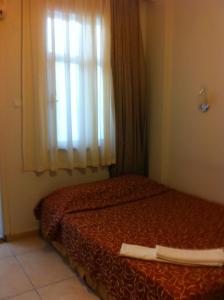 Postel nebo postele na pokoji v ubytování Hotel Vanilla