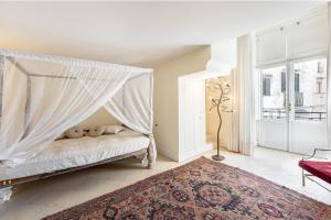 Postel nebo postele na pokoji v ubytování Casa Bormioli - Maison de Charme