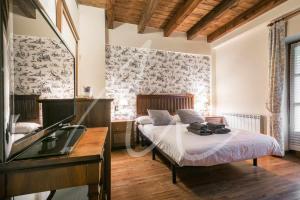 Postel nebo postele na pokoji v ubytování Casa Eth Gauèc by SeaMount Rentals