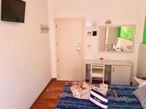 TV a/nebo společenská místnost v ubytování Hotel Arena