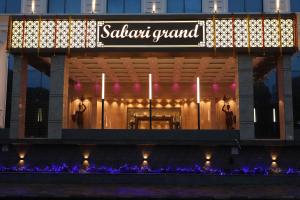 a building with a sign that reads sabrina grand at Quality Inn Sabari in Chennai