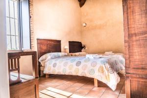 Cama o camas de una habitación en Lagar de Viña Vieja