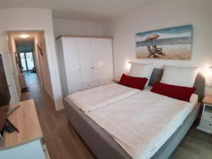 Postel nebo postele na pokoji v ubytování Riecht nach Meer