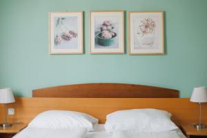 Posteľ alebo postele v izbe v ubytovaní Hotel Garni - Gasthof Pillgrab