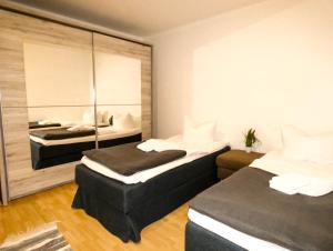 Katil atau katil-katil dalam bilik di SUNNYHOME Monteurwohnungen und Apartments nahe Regensburg