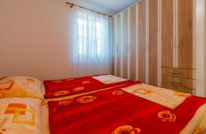 Postel nebo postele na pokoji v ubytování Navy Apartments