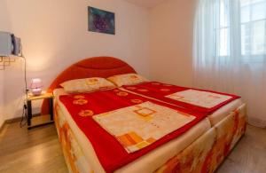 Postel nebo postele na pokoji v ubytování Navy Apartments