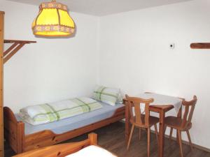 Łóżko lub łóżka w pokoju w obiekcie Holiday Home Eberharter by Interhome