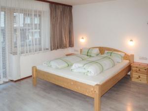 Łóżko lub łóżka w pokoju w obiekcie Holiday Home Eberharter by Interhome