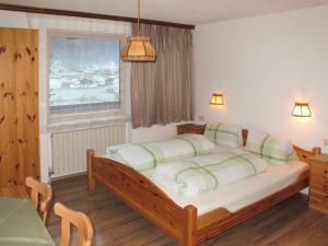 Łóżko lub łóżka w pokoju w obiekcie Holiday Home Eberharter by Interhome