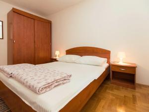 Posteľ alebo postele v izbe v ubytovaní Apartment Nikol-2 by Interhome