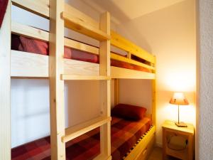 Кровать или кровати в номере Apartment Plein Soleil-1 by Interhome