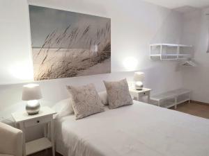 Postel nebo postele na pokoji v ubytování Villa Palmarsu + 5 fotografií