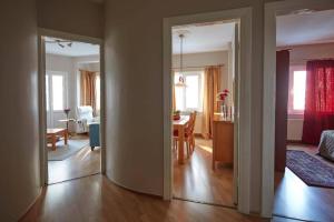 a hallway with a living room and a dining room at Cozy Apartment Next to Taksim Square in Istanbul