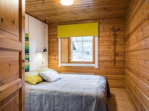 Postel nebo postele na pokoji v ubytování Holiday Home Lomaylläs b39 -suppapolku 6b by Interhome