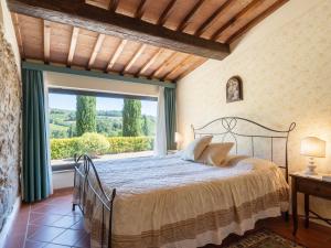 Ένα ή περισσότερα κρεβάτια σε δωμάτιο στο Holiday Home Il Sangiovese by Interhome