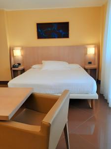 Katil atau katil-katil dalam bilik di Hotel Chiaraluna